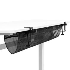 a white table with black mesh hanging from it's sides and two handles on each side