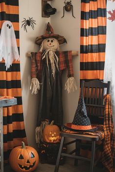 a halloween scene with pumpkins, jack - o'- lanterns and other decorations