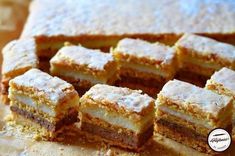 several pieces of cake sitting on top of a cutting board