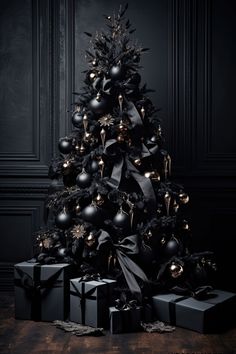 a black christmas tree with presents under it