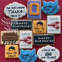 decorated cookies are arranged in the shape of cats, dogs, and other things that say happy birthday