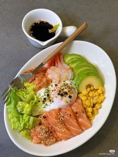 a white plate topped with different types of food