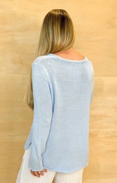 Get cozy with this beachy light blue sweater. Featuring a playful white print that reads "beach," this sweater is perfect for lounging by the ocean or just adding some seaside vibes to your look. Stay warm and stylish with this quirky piece! Ashley is 5'4" and is wearing a size medium. Oversized Light Blue Winter Sweater, White One-size Beach Sweater, Cozy Light Blue Knitted Sweater, Light Blue Cozy Cotton Sweater, Winter Light Blue Textured Knit Sweater, Beach Sweater, Light Blue Sweater, Getting Cozy, Sweater Blouse