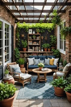 an outdoor living area with potted plants and furniture