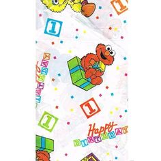 the sesame character towel is on display in front of a white background with colorful blocks and numbers