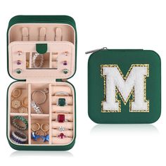 a green case filled with lots of jewelry