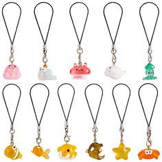 six different colored plastic animals on black cord necklaces, each with an animal charm