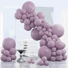 some balloons are floating in the air on a table