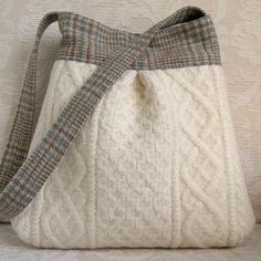 a white purse with a bow on it