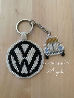 a beaded keychain with a volkswagen emblem on it