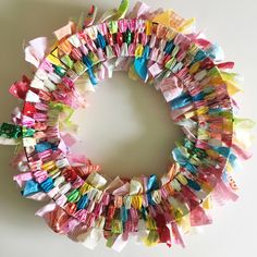 a close up of a wreath made out of small pieces of paper