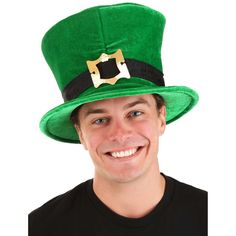 a man wearing a green hat and smiling