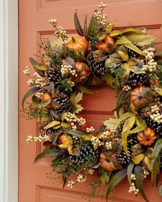 Bring the splendor of the season into your home with warm earth tones and natural accents. Faux fall leaves, pumpkins, sprigs of berries, and pinecones provide effortless autumnal beauty to your entryways and tablescapes. Colored Door, Realistic Christmas Trees, Dried Wreath, Fall Thanksgiving Wreaths, Foliage Wreath, Late Autumn, Artificial Foliage, Faux Greenery, Fall Deco