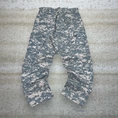 "Vintage Military Digital Camo Tactical Pants Baggy Fit Double Knees Cargos Medium Regular Button Fly Combat Gear 90s Skate / Streetwear Great Condition: 9/10 Men's Size:  Waist: 32\" Length (inseam): 30\" Leg Opening: 8\" Thigh Opening: 13\" Front Rise: 13\"" Military Style Cargo Pants, Combat Parachute Pants With Multiple Pockets, Tactical Khaki Cargo Pants For Streetwear, Baggy Military Cargo Pants, Baggy Combat Pants For Outdoor, Tactical Camouflage Bottoms With Pockets, Combat Style Cargo Pants, Baggy Combat Cargo Pants For Outdoor, Baggy Military Cargo Jeans For Outdoor