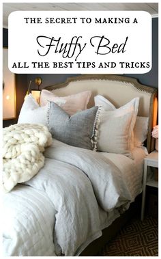 a bed with pillows and blankets on top of it in front of a wall that says, the secret to making a fluffy bed all the best tips and tricks