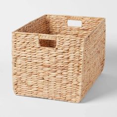 a large woven basket with handles