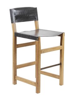 a wooden chair with black leather upholstered seat and back rests against a white background