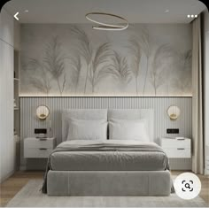 a bedroom with a bed, nightstands and paintings on the wall behind it in shades of gray