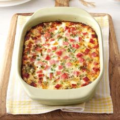 a casserole dish with ham, cheese and vegetables