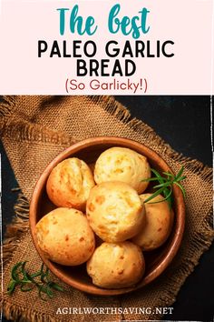 the best paleo garlic bread so garlicky in a bowl with herbs