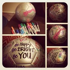 there is a soccer ball with writing on it and crayons next to it