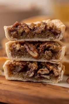 three pieces of pecan pie stacked on top of each other