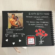 a black notebook with pictures and writing on it