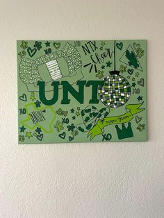 a painting on the wall that says, my heart is unt