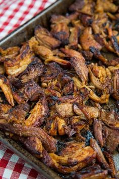 the meat is cooked and ready to be put in the oven on the tablecloth