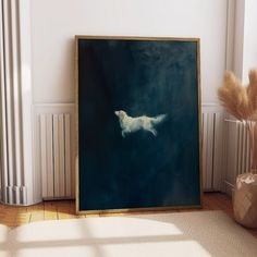 a white dog is floating in the water on a blue background, framed in gold frame