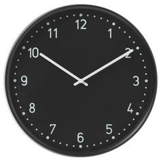 a black clock with white numbers on the face