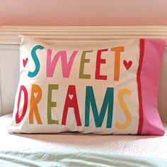 a pillow that says sweet dreams on it