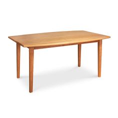 a wooden table sitting on top of a white floor