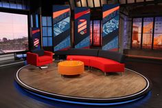 the set of nbc's sports news with couches and chairs