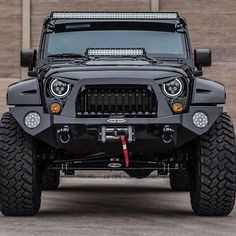 the front end of a black jeep