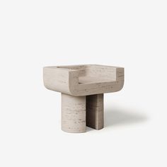 the concrete table is shaped like an object