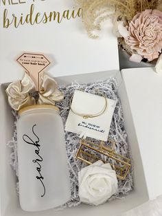 the bridesmaid gift set includes a bottle, bracelet and ring