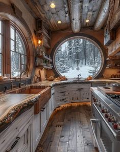 a kitchen with an oval window and wooden floors in front of the stove top oven