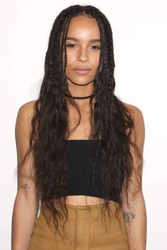 close up shot of zoe kravitz with curly box braids ends, wearing black crop top and mustard skirt Box Braids Ends, Curly Box Braids, Zoe Kravitz Braids, Mustard Skirt, Hairstyles Braid, Blonde Box Braids, Short Box Braids, Jumbo Box Braids, Curls Hairstyles