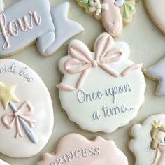 decorated cookies with princess sayings on them for a bridal party or baby shower