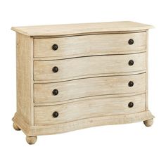 a white dresser with four drawers on it