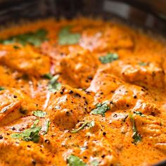 a close up of food in a pan on a table