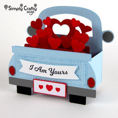 a card with hearts in the back of a truck