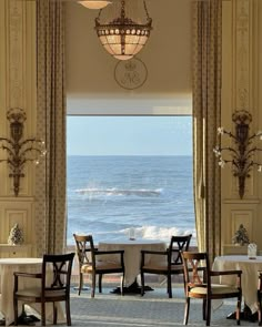 an elegant dining room overlooking the ocean