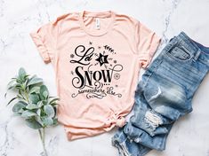 Let It Snow Somewhere Else Shirt, Christmas Shirt, Let It Snow Tee, Family Christmas Gift, Funny Christmas Shirt, Christmas Vacation Shirt Hi There! We use one of the best quality t-shirt brands out there! Bella & Canvas. Super comfy, cozy and oh so soft! Did we also say Bella & Canvas shirts are Eco friendly and fair trade? Well yes they are! Here is some more info: * All Solid Colors are 100% Cotton. * All Heather Colors are combined with cotton and poly mix which makes them extra soft Artsy Shirt, Xmas Tees, New Years Shirts, Merry Christmas Shirts, Xmas Shirts, Hiking Shirts, Beach T Shirts, Teacher Tshirts, Comfy Cozy