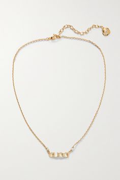 Gucci’s necklace is a delicate, refined way to show your love for the brand. Designed with a dainty gold-tone chain, it's strung with two lustrous faux pearls and centered by a fixed pendant cast to depict the Maison's moniker. Elegant Gucci Jewelry For Wedding, Elegant Gucci Chain Necklace, Gucci Necklace With Adjustable Chain For Gift, Gucci Jewelry With Adjustable Chain For Gift, Gold Gucci Necklace For Gift, Gucci Gold Necklace For Gift, Gucci Gold Necklace Perfect For A Gift, Gucci Necklace Gold, Gucci Necklace