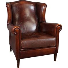 a brown leather chair on a white background