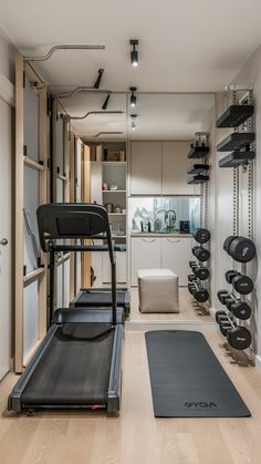 a home gym with treads and exercise equipment