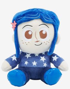 a stuffed toy doll with blue hair and stars on it's chest, sitting in front of a white background