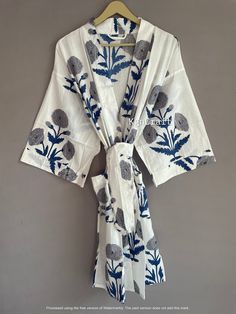 This kimono is made very neatly, and the matching strap has also been used in almost many places in the kimono, which makes the kimono very much. giving a beautiful look It looks good in the photo, but it looks great after wearing this kimono 100% Soft Cotton Hand Block Print Fabric Robe. The perfect to cover up your dance costume, to use for a dinner party or just slip into in on a beautiful summer morning. This particular beauty has a Japanese feeling to it. Cotton kimono robes are perfect for lounging around the home or spa. Use our Floral Hand block print robe :) Measurements: Size: Short & Free Size/ Plus Size Bust Approx: 120 CM ( 47 inch ) Length:100 CM ( 39 inch ) :) Fabric: 100% Pure Soft Cotton Fabric :) 2 Side Pockets :) Color: Multi-color as Shown in Image. Note: Due to Differe Long Summer Robe For Sleep, Long Summer Sleep Robe, Traditional Summer Kimono With Block Print, Traditional Summer Block Print Kimono, Cotton Sleepwear With Kimono Sleeves For Home, Summer Home Sleepwear With Kimono Sleeves, Summer Sleepwear With Kimono Sleeves For Home, Long Summer Sleepwear For Home, Long Sleepwear For Home In Summer